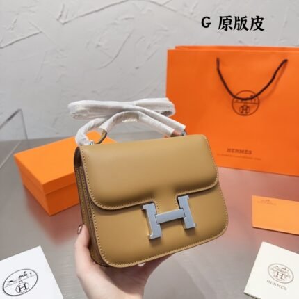 Hermès Constance Swift cowhide leather Earthy yellow size: 19cm