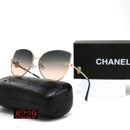 Chanel gold rimmed and dark green orange gradient water droplet shaped sunglasses