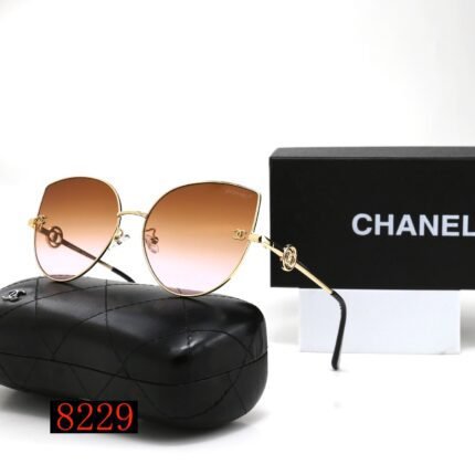 Chanel gold rimmed and orange gradient droplet shaped sunglasses