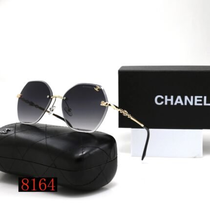 Chanel black transparent gradient and gold edged hexagonal round frameless sunglasses