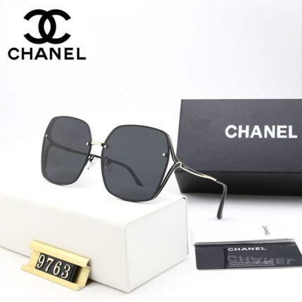 Chanel black bezels, gray lenses, white triangular decorative sunglasses