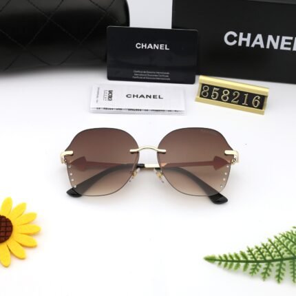 Chanel aviator gold rimmed and brown round arrow sunglasses