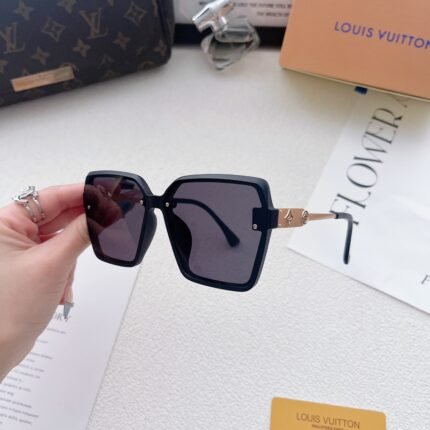 Louis Vuitton dark purple gradient lenses with gold rimmed hexagonal sunglasses