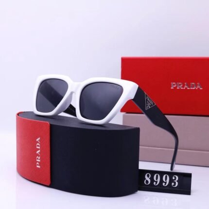 PRADA   Black frame with white edges and black lenses, cat's eye quadrilateral sunglasses