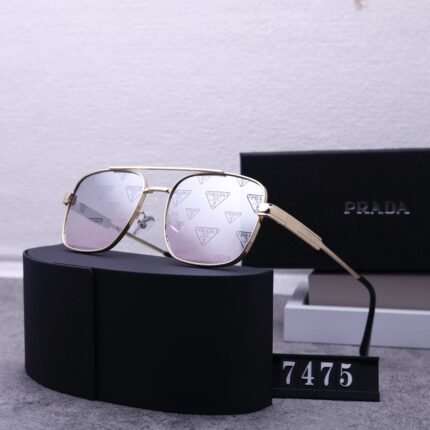 PRADA   Luxury sunglasses with gold border and light purple printed lenses