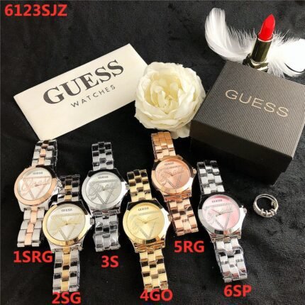 GUESS watch circular minimalist dial steel strap