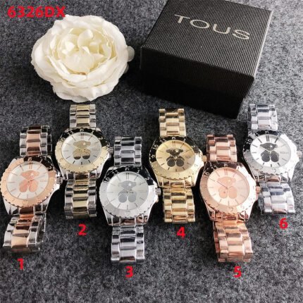 TOUS light luxury circular minimalist dial with multiple steel bands