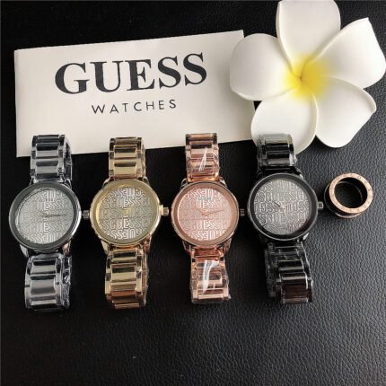 GUESS watch circular minimalist dial steel strap