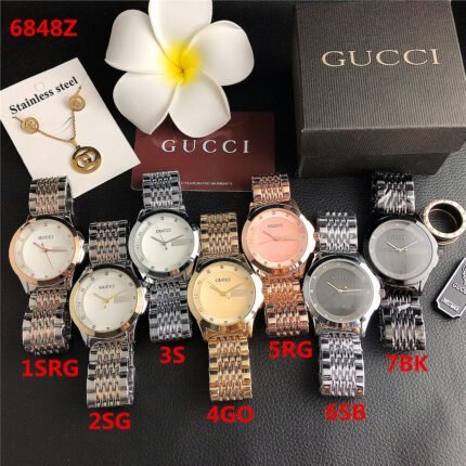 Gucci watch circular minimalist dial steel strip