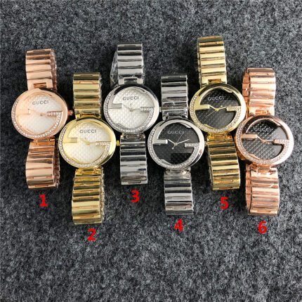 Gucci watch circular bezel dial steel strip