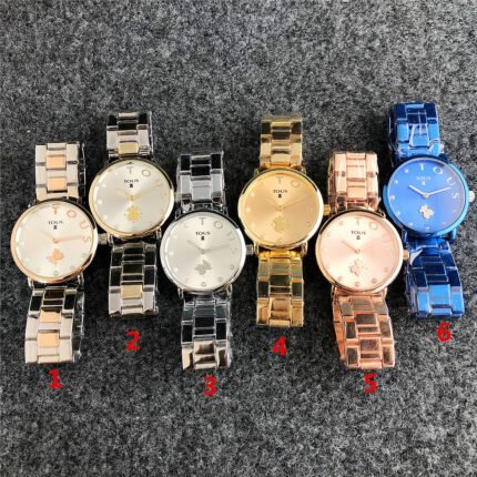 TOUS watch circular peach silk pattern minimalist dial metal steel strip