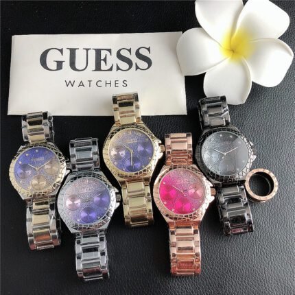 GUESS watch circular minimalist dial steel strap