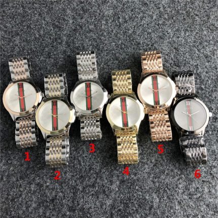 Gucci watch circular bezel dial steel strip