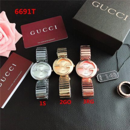 Gucci watch circular bezel dial steel strip