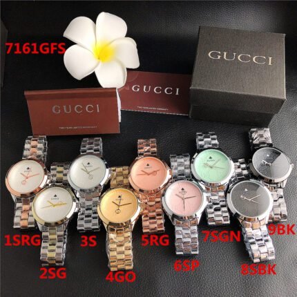 Gucci watch circular minimalist dial steel strip