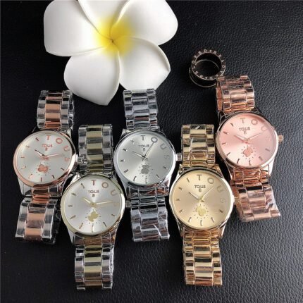 TOUS watch circular peach silk minimalist dial metal steel strip