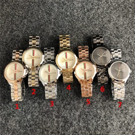 Gucci watch circular minimalist dial steel strip