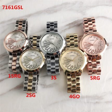 GUESS watch circular minimalist dial steel strap