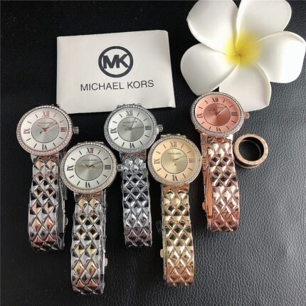 MK watch circular minimalist dial with diamond border metal strap