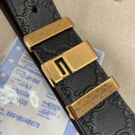 Gucci belt. Exquisite patterned black belt with gold ornate buckle. Exquisite pattern. Detailed oil edges.