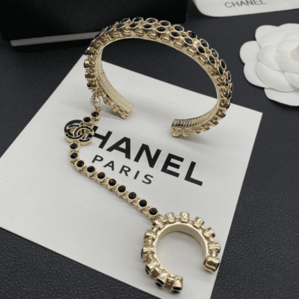 Fashionable niche black zircon inlaid open gold bracelet ring tassel chain integrated