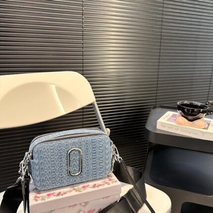 Fresh and trendy Mark Jacob denim camera