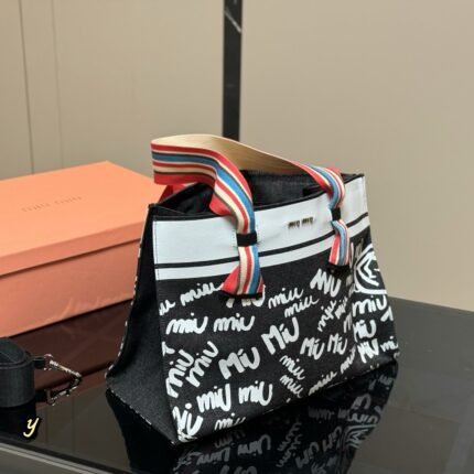 The canvas tote with a graffiti design features a striking color contrast, making it eye-catching