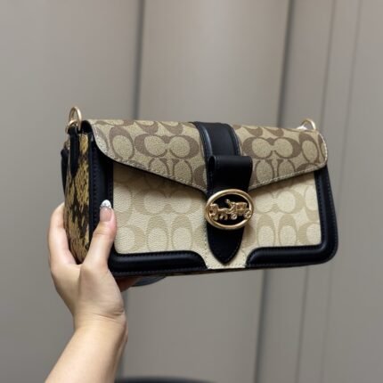 Coach's classic and versatile bag, equipped with dual shoulder straps, offers a wide range of styles and colors for purchase