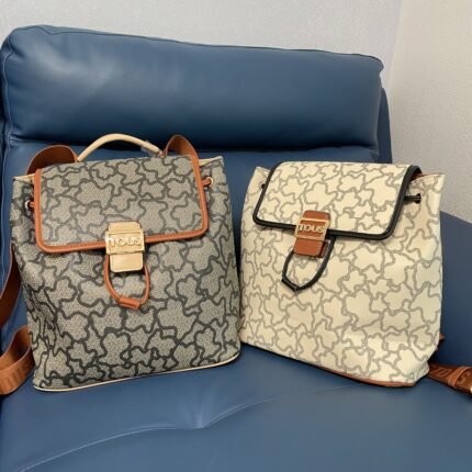 TOUS Signature Monogram Backpack: Retro Contrast-Color Commuter Bag